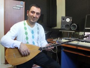 Erzurumlu  müzisyen kadına şiddet için yazdı