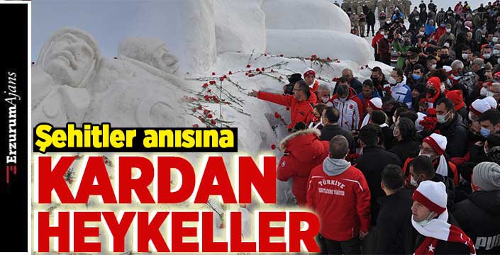 Kardan heykellere kırmızı karanfil bırakıldı