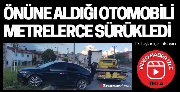 Tır, otomobili refüje sürükledi